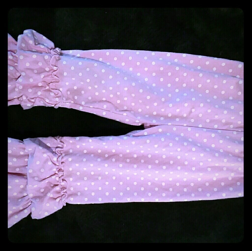 Bubble gum pink stretchy flare baby pants.